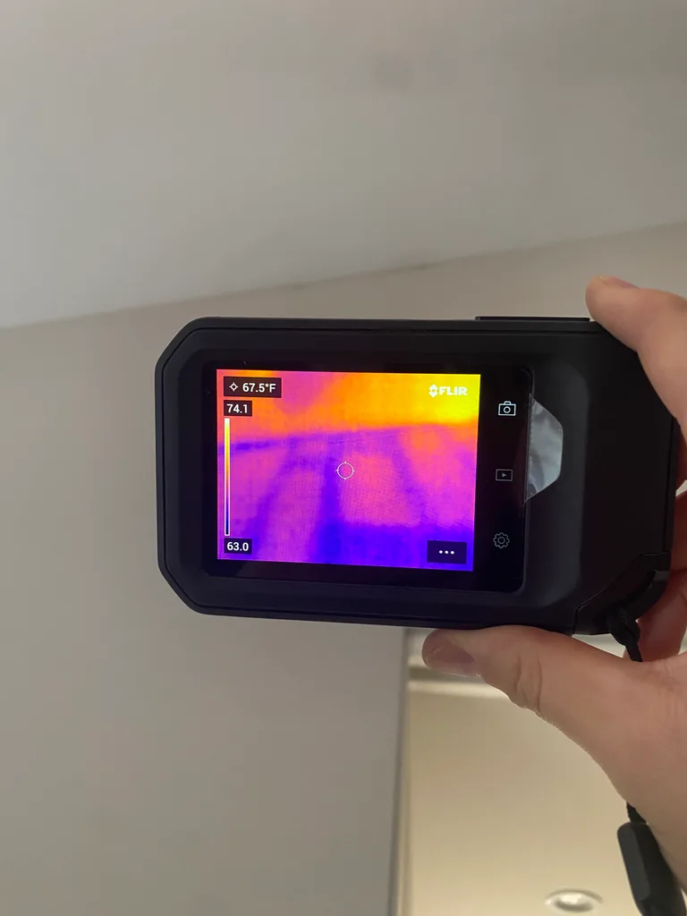 Thermal imaging camera inspecting ceiling